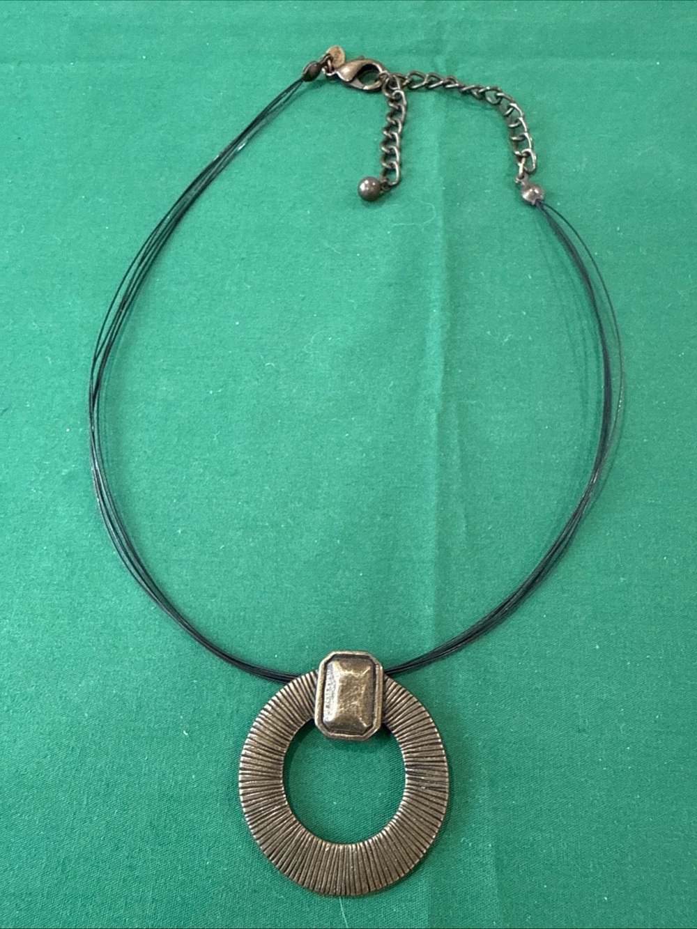 Chico’s Multi-strand Black Cord Necklace W/Textured Brass Tone Ring Pendant 89F
